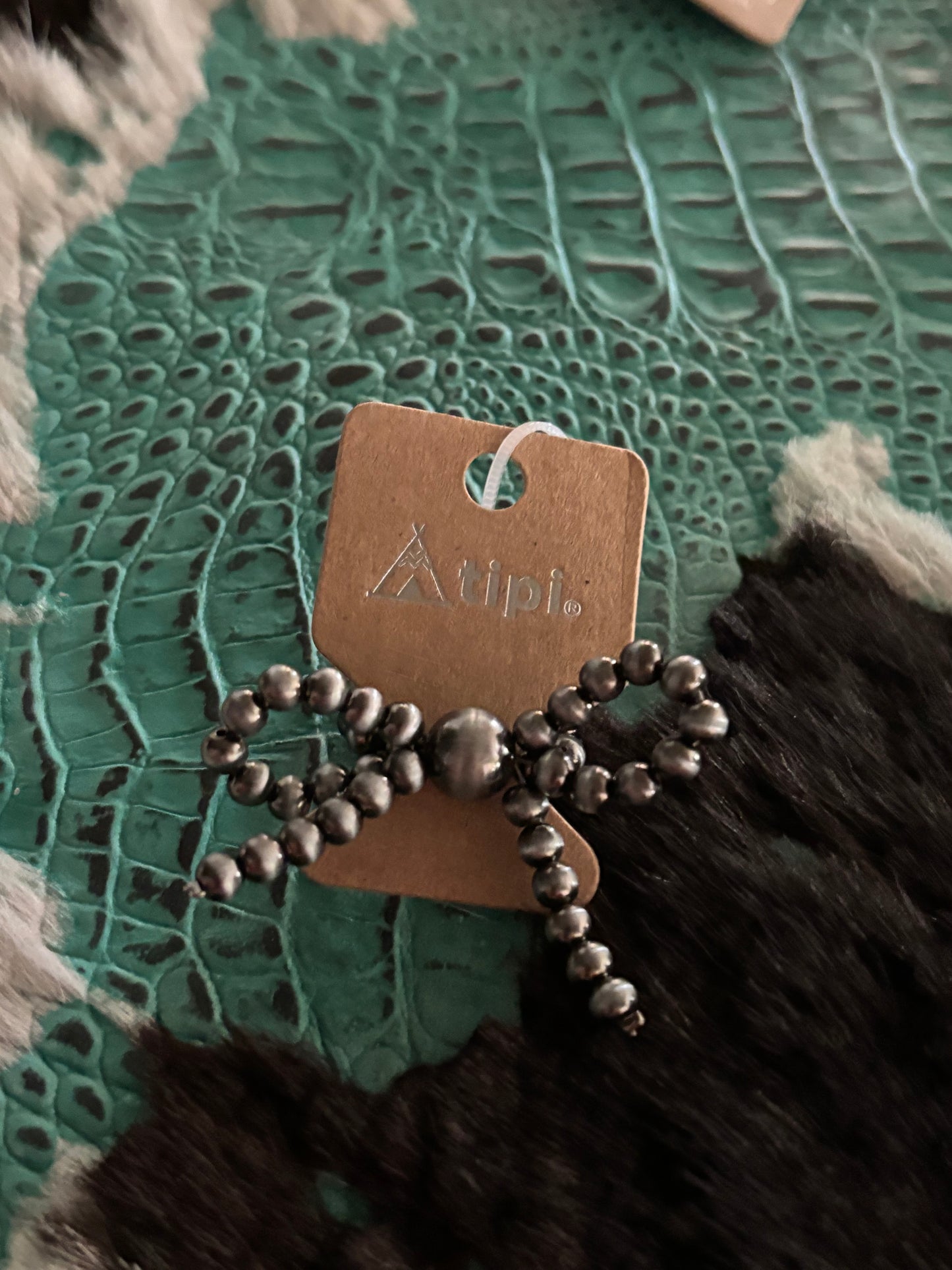 TIPI ROXIE SILVER PEARL BOW STRETCH RING