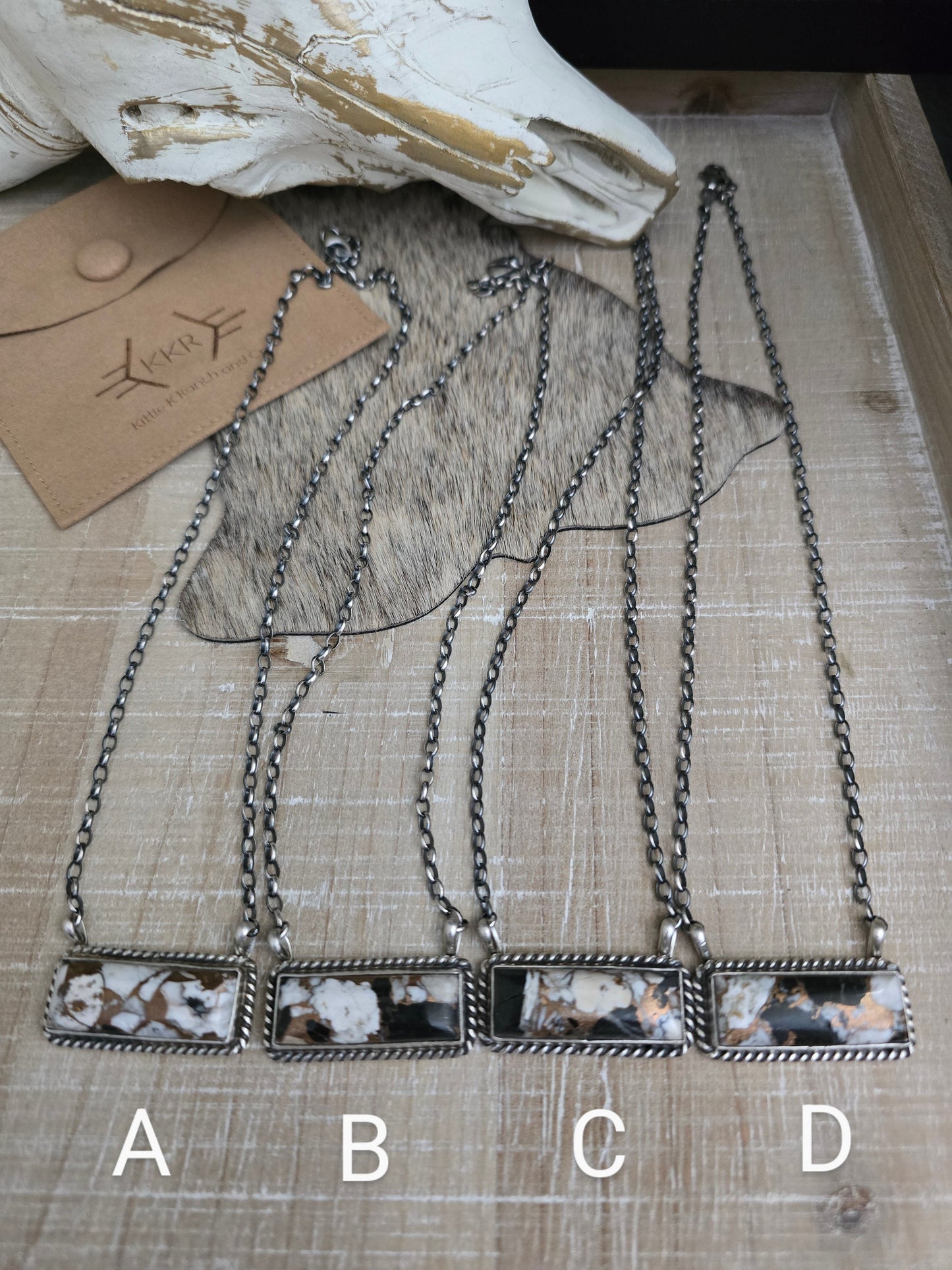 THE AUGUSTINE LARGO WHITE BUFFALO AND BRONZE LARGE BAR NECKLACE