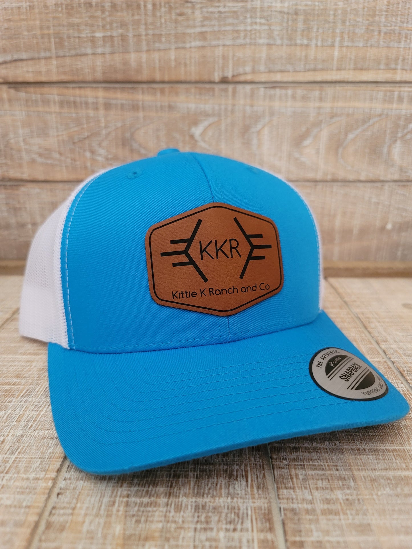 KITTIE K RANCH AND CO LEATHER PATCH SNAPBACK HAT