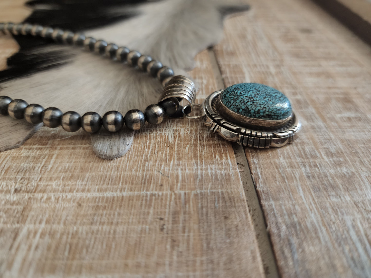ROBERT SHAKEY KINGMAN WEB TURQUOISE PENDANT