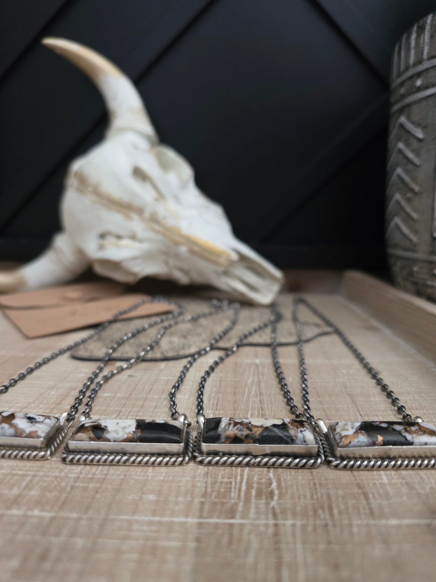 THE AUGUSTINE LARGO WHITE BUFFALO AND BRONZE LARGE BAR NECKLACE