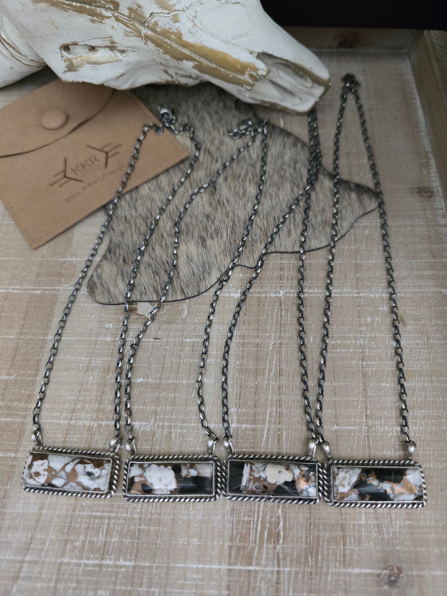 THE AUGUSTINE LARGO WHITE BUFFALO AND BRONZE LARGE BAR NECKLACE