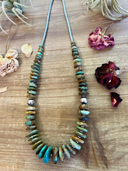 22 inch graduated turquoise necklace with Sterling silver pearls