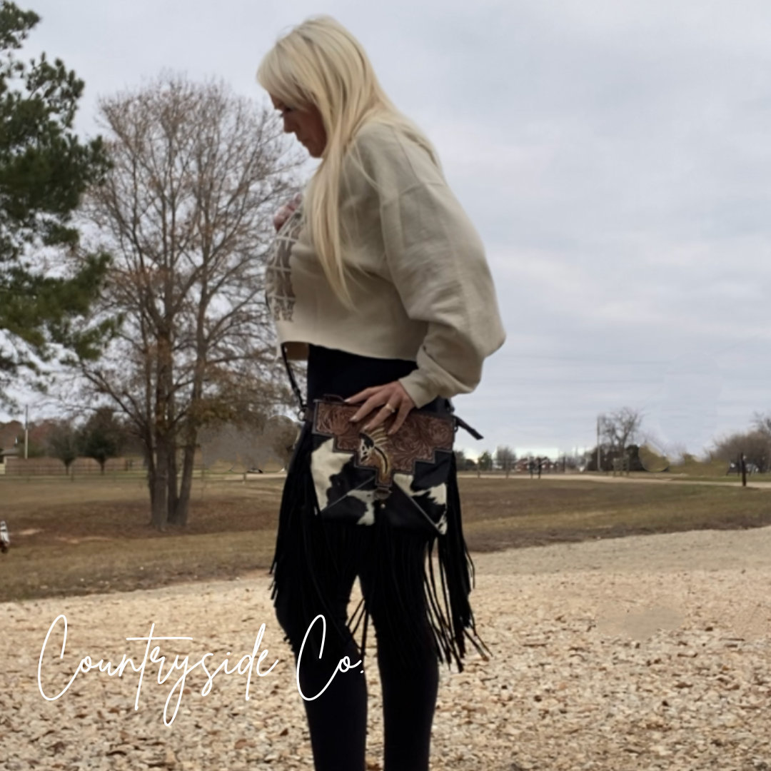 The Outlaw Cowhide Fringe Purse by Countryside Co. ONLY AT COUNTRYSIDE CO.