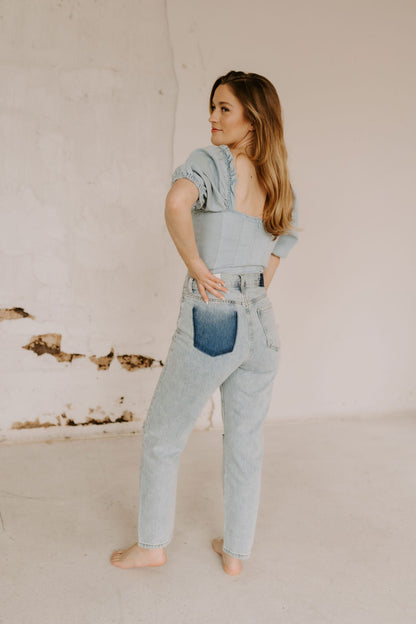 The Riley Denim Bodysuit in Light Wash